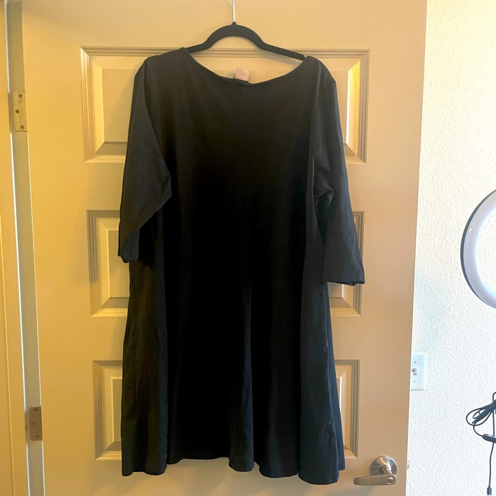 Three quarter sleeve black dress